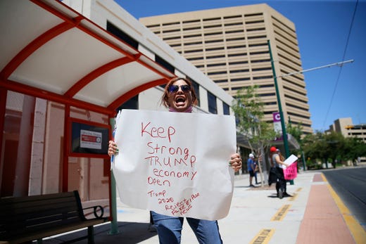 Safely Open Texas Now rally Saturday, April 25, across the street from the El Paso County Court House in El Paso. Protesters demanded elected officials safely reopen the State of Texas, the County of El Paso and the city of El Paso for business.