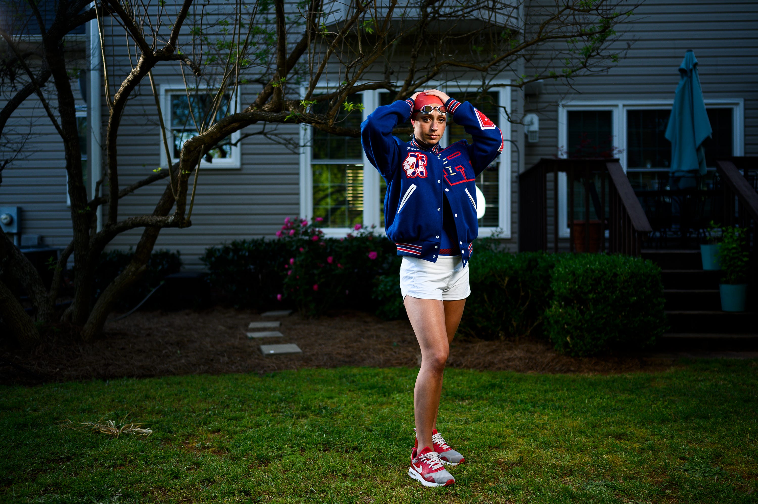 Riverside High School's Hannah Ownbey poses for a portrait in her back yard Tuesday, April 21, 2020. Ownbey is The Greenville New's 2019-20 All-Upstate girls swimmer of the year.