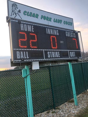 The scoreboard at Clear Fork High School honored seniors Carson Crowner and Brooke Robinson by shining their jersey numbers.