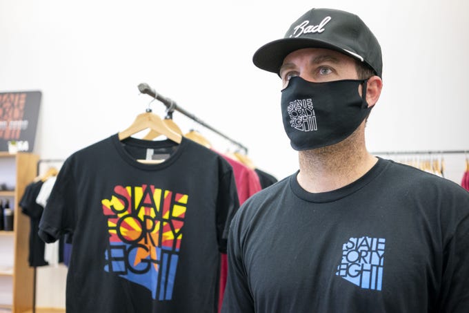 Mike Spangenberg, one of the owners of State Forty Eight, a Chandler clothing company, is giving away face masks free of charge with each online order.