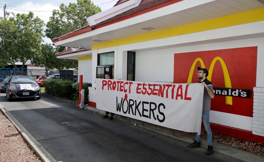Protesting what they say is a lack of personal protective equipment, employees close down the drive-thru at a McDonald's restaurant in Oakland, Calif., on April 21.