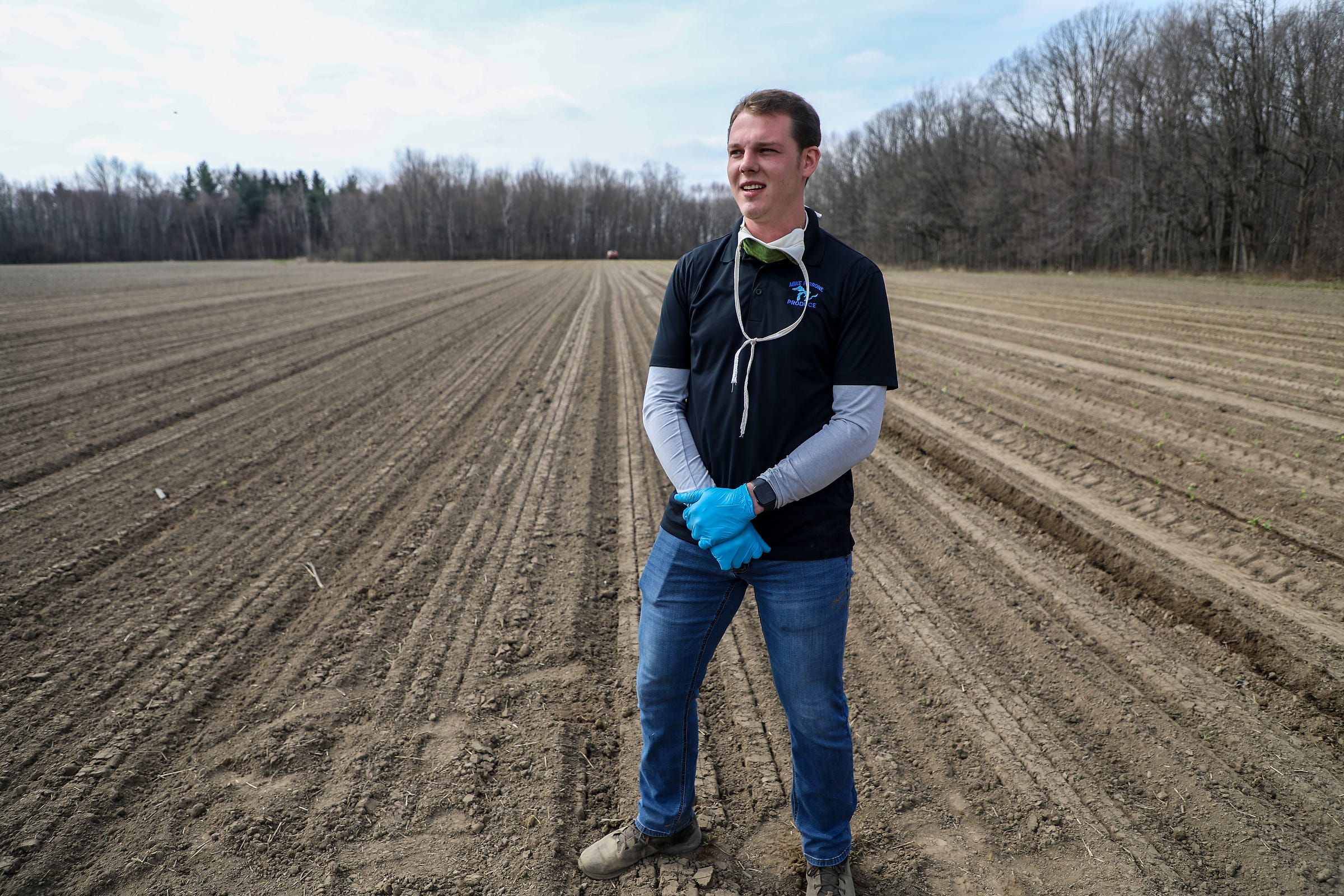 Matt DeBlouw is president of Mike Pirrone produce, a 1,200-arce farm there in Capac, Mich, and is photographed at an organic kale field where they are planting on Tuesday, April 28, 2020. Mike Pirrone Produce is a part of a network of farmers throughout the Great Lakes region that supply veggies to places like Kroger, Walmart, Meijer. DeBlouw says supermarkets are now more focused on vital, longer-lasting produce such as potatoes, onions and carrots and he and his fellow farmers have to plant now and hope in the fall they'll have a market for their products.