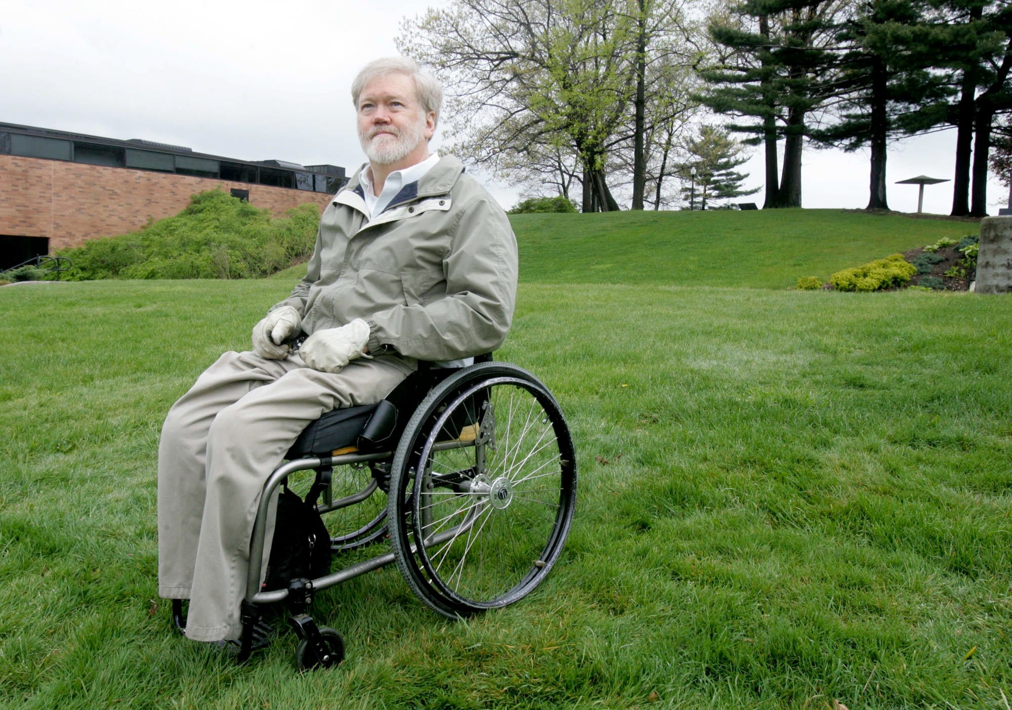 Dean Kahler recalls the May 4, 1970, shootings from the spot where he was shot and paralyzed as he talks about that day's events on the campus of Kent State University Monday, April 26, 2010, in Kent, Ohio. [KAREN SCHIELY/AKRON BEACON JOURNAL]