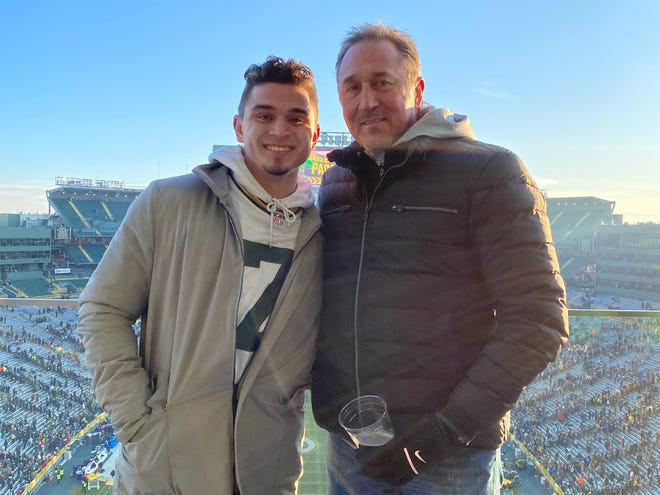 Bo Majkowski with his father, former Green Bay Packers quarterback Don Majkowski, at Lambeau Field.