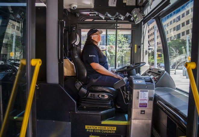 Capital Metro has put in place more precautions for its bus drivers to protect them from the coronavirus. Buses also are being sanitized multiple times throughout the day. (Ricardo B. Brazziell/Austin American-Statesman/TNS)