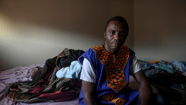 John Deranamie, a Smithfield Foods employee, poses