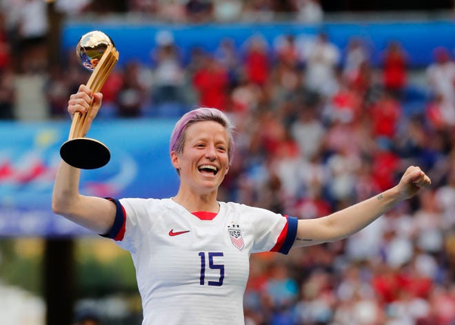 U.S. forward Megan Rapinoe celebrates with the Golden Ball after winning the Women's World Cup France in 2019.