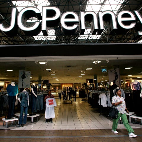 A customer leaves a J.C. Penney store in Tallahass