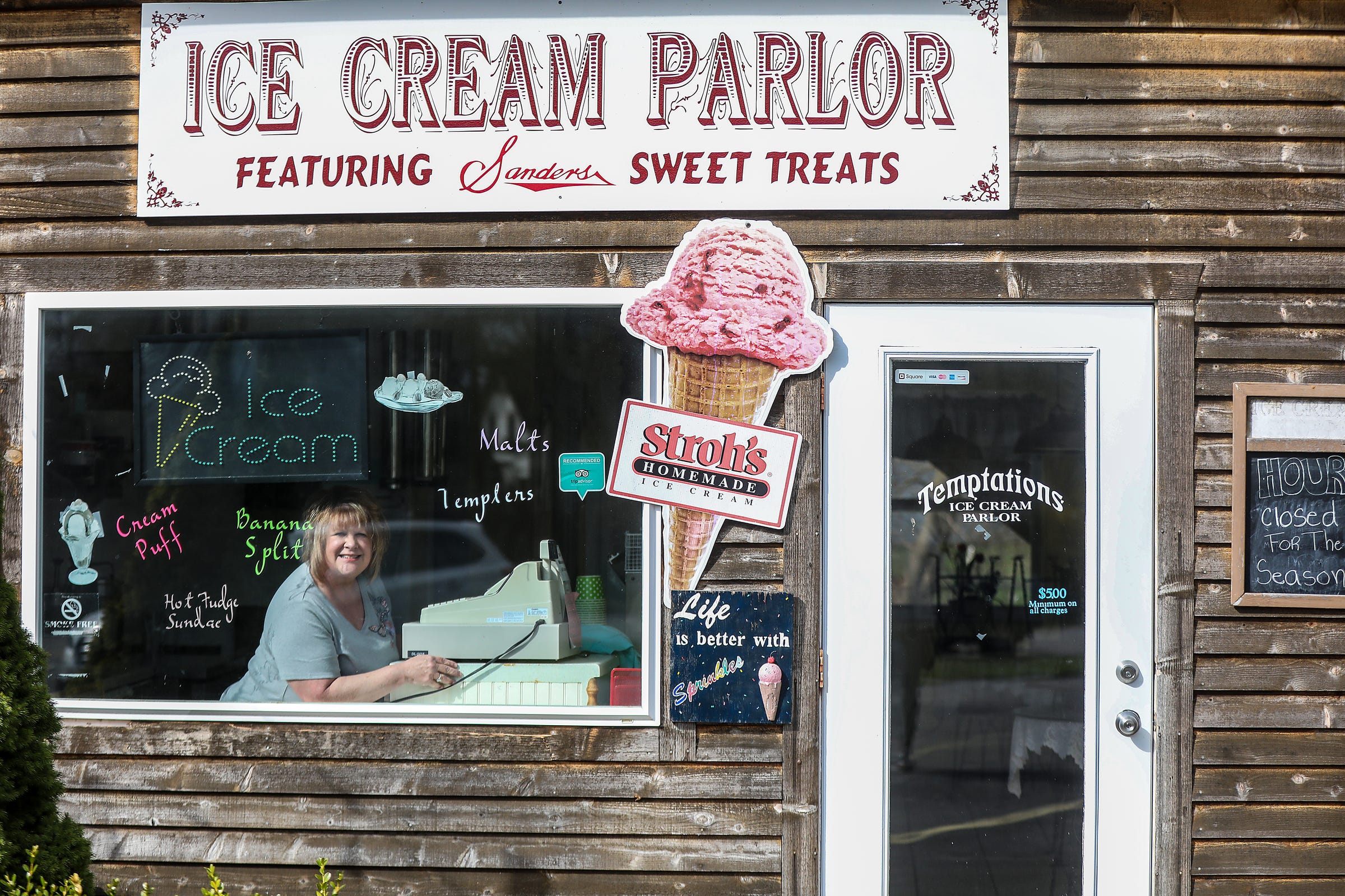 Nadine Maliniak, 58, of Lexington owns and operates A Night to Remember Bed and Breakfast, an Antique shop and a Temptations Old-fashioned Ice Cream Parlor on her property close to downtown Lexington, Mich., photographed on Friday, May 1, 2020. Maliniak plans to replace the picture window with a walk-up window so people can place orders without coming inside.