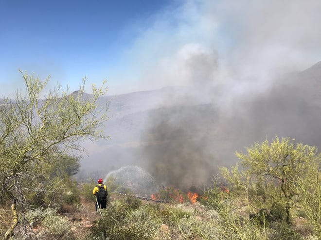 Brush fire closes Interstate-17 at New River Road.