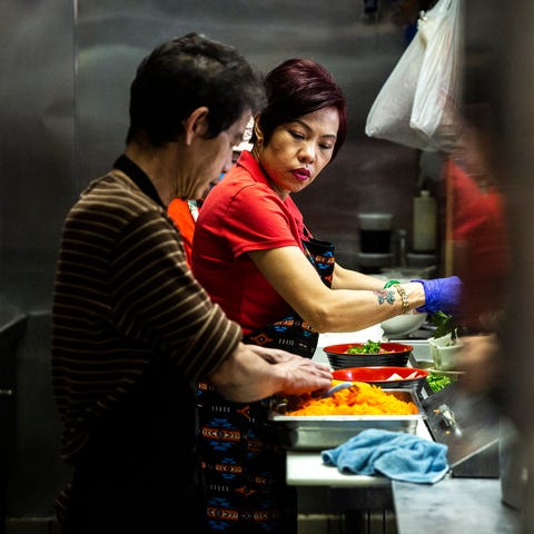 Brenda Tran, owner of the Vietnam Cafe, works in t