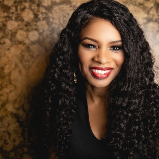 Christian artist Nicole C. Mullen describes husband's abuse in book