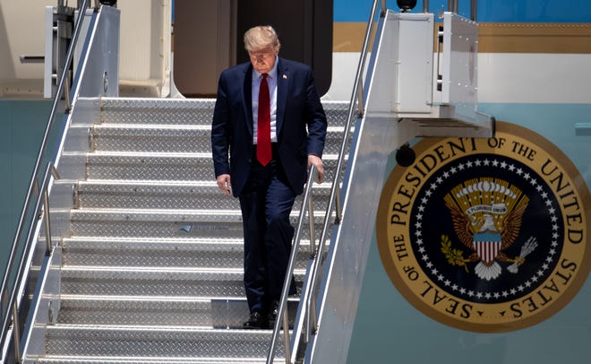 President Donald Trump walks off Air Force One on May 5, 2020, after arriving at Phoenix Sky Harbor International Airport.