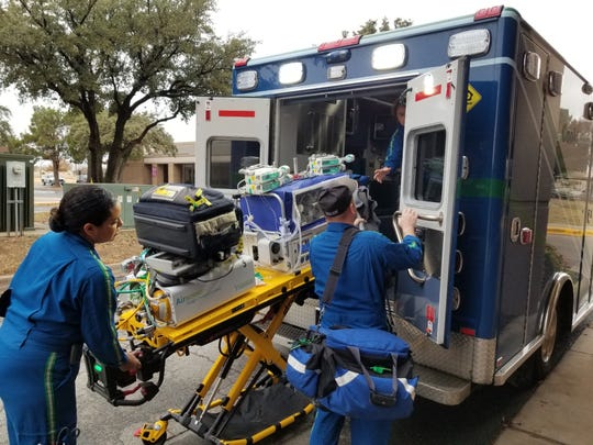 One of the preemie Morgan twins is loaded for transport from Abilene to Fort Worth, Texas.