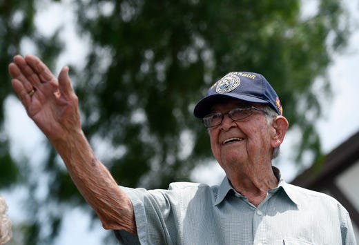 Bob Batterson receives a surprise, drive-parade for his 99th birthday, Friday, May 8, 2020. Batterson is a World War II veteran and Pearl Harbor survivor. 
