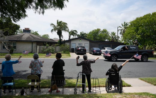 Bob Batterson receives a surprise, drive-parade for his 99th birthday, Friday, May 8, 2020. Batterson is a World War II veteran and Pearl Harbor survivor. 