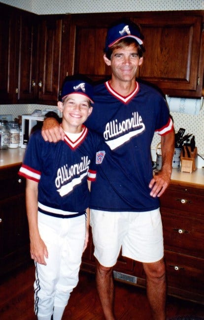Dennis Barrett with his youngest son, Bryan, when he was a child. Dennis' wife, Sally Barrett, said he coached his children in every sport imaginable.