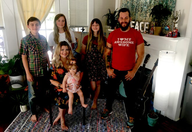 Prattville resident and mother Jonna Turberville, seated with baby Bellanova  Star Turberville, with from left, Ethan Scott, 12, Grace Scott, 18, Ariana Jayne Turberville, 17, and Jonna's husband Justin Turberville.