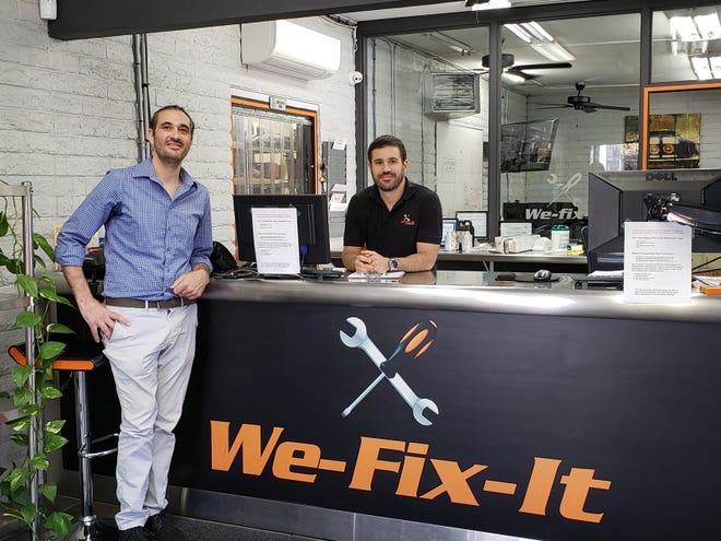 Gift3R App CEO and founder Anastasios Tirkas meets with We-Fix-It Auto Repair owner Andreas Stylianou, one of the small business merchants that has found success with Tirkas' electronic gift card platform.
