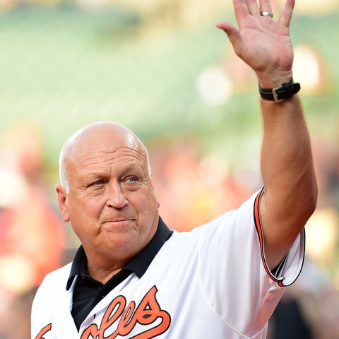 Cal Ripken Jr. waves to the crowd prior to a game.