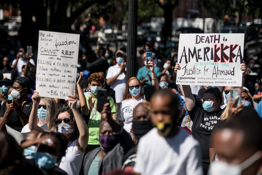 Demonstrators protest the shooting death of Ahmaud Arbery at the Glynn County Courthouse on May 8, 2020 in Brunswick, Georgia.