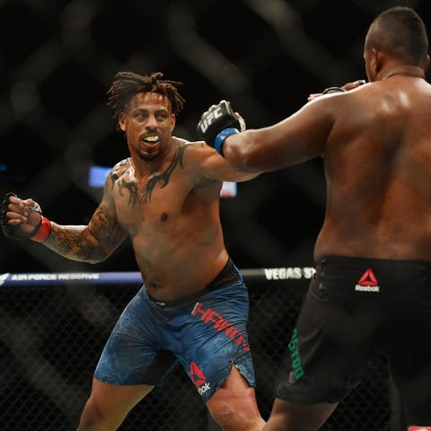 Greg Hardy (red gloves) fights Yorgan De Castro (b