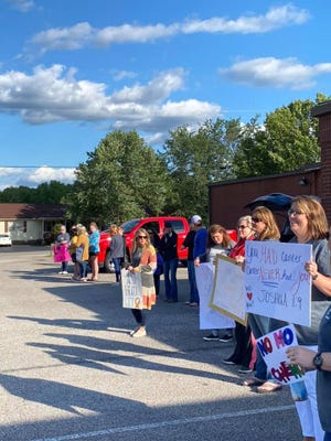Families gathered in the parking lot of Westover Elementary to celebrate with Elise Eads for finishing her chemotherapy.