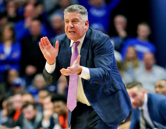 Auburn coach Bruce Pearl claps during a game against Kentucky at Rupp Arena on Feb. 29, 2020 in Lexington, KY.