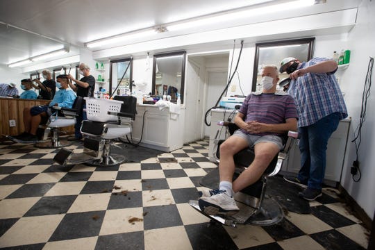 Barbershops, hair salons slowly reopen in Tallahassee