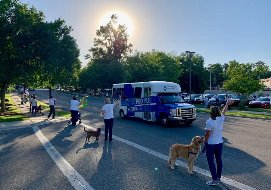 Over 40 of Tallahassee Memorial's animal therapy teams (a handler and their pups) gathered at shift change to thank colleagues for their efforts in fighting COVID-19.