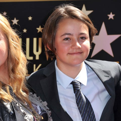 Melissa Etheridge poses with her son Beckett durin