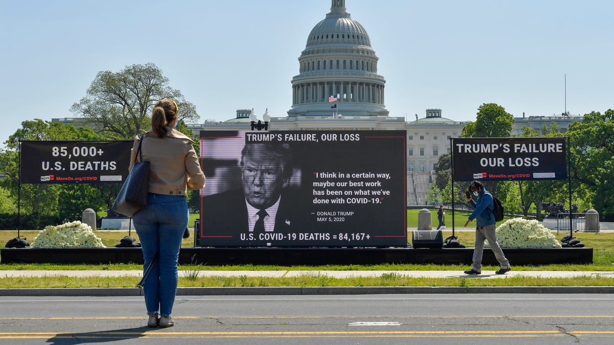 Activists stage a COVID-19 memorial event in Washington, DC near the U.S. Capitol building on May 13, 2020 honoring the over 80,000 people who have died from the virus in the U.S.