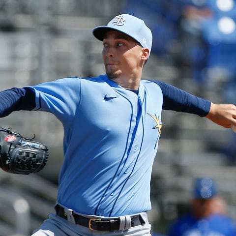 Rays starting pitcher Blake Snell delivers a pitch