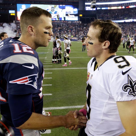 New England Patriots quarterback Tom Brady, left, 