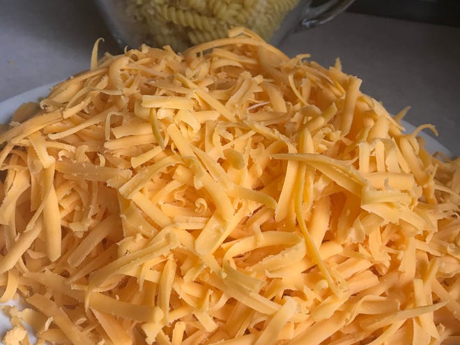 Cheese grated off the block melts better than shredded cheese from bags.