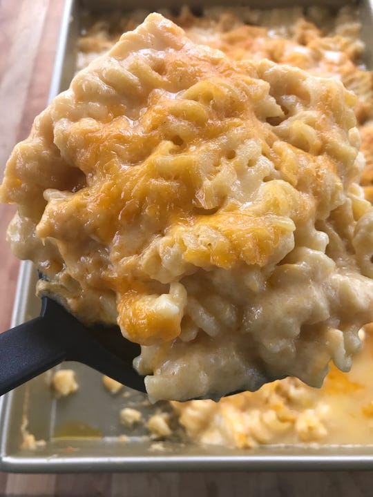 Homemade rotini noodles and sharp cheddar cheese bake (aka mac and cheese) has become a Higgins Eats family favorite.