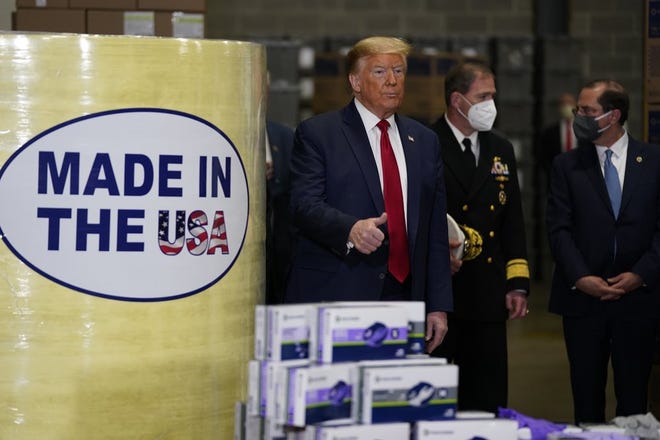 President Donald Trump participates in a tour of Owens & Minor Inc., a medical supply company, Thursday, May 14, 2020, in Allentown. Photo by Evan Vucci