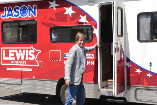 U.S. Senate candidate Jason Lewis gets off his tour bus during his "Reopen Minnesota for Business" tour Friday, May 15, 2020, in St. Cloud.