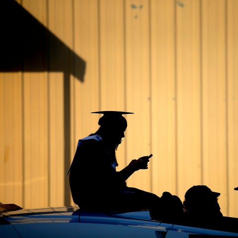 Newcastle High School senior Mindy Cosby waits in 