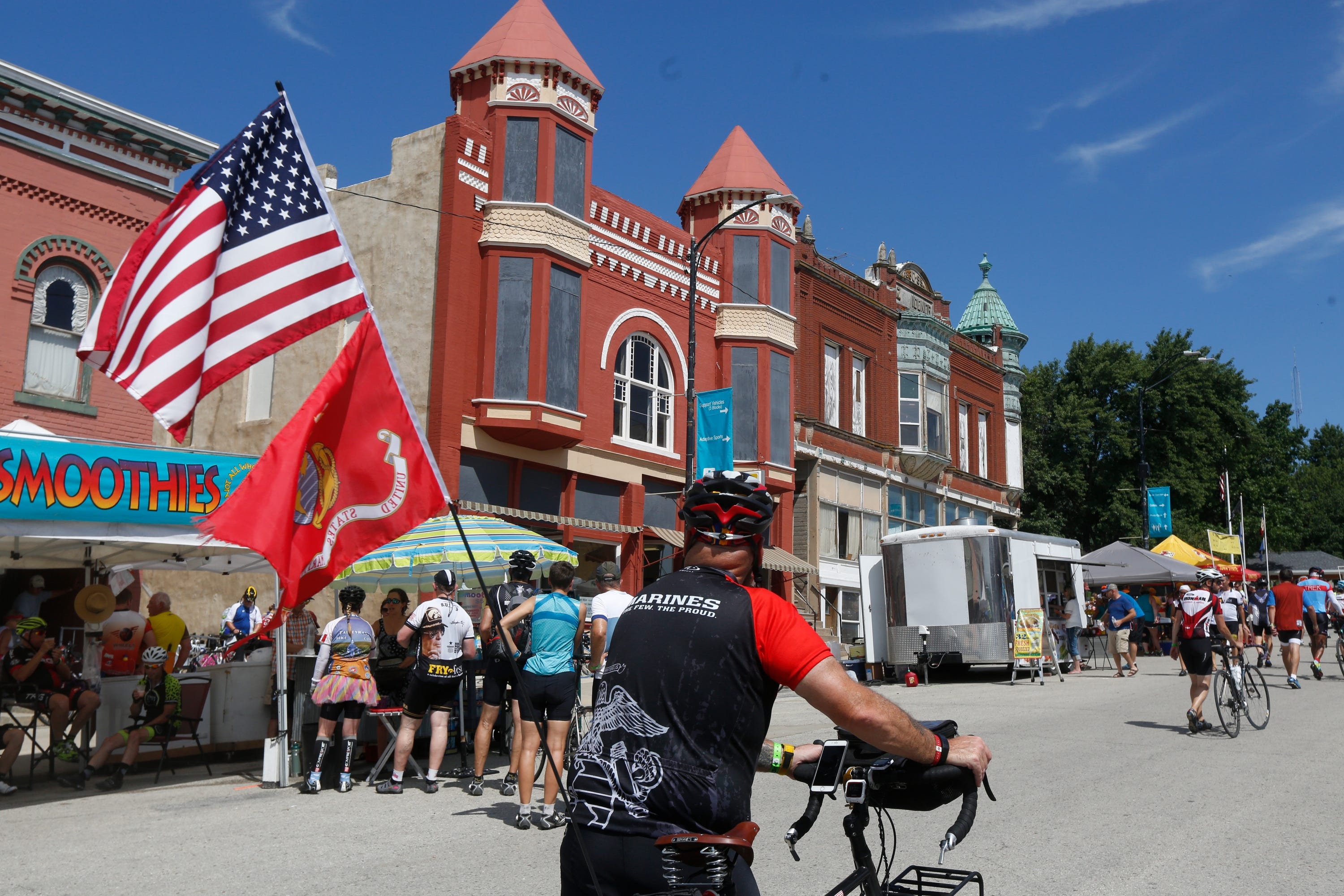 Riders arrive in Corning, Iowa, during the RAGBRAI long-distance bike ride in July 2016.
