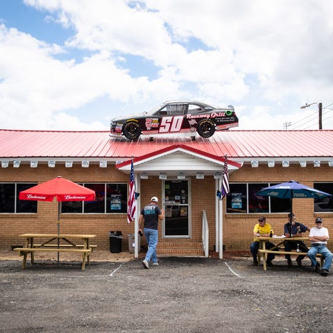 Fans begin to gather outside the Raceway Grill in 