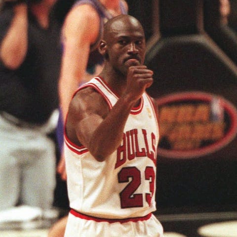 Michael Jordan celebrates after beating the buzzer