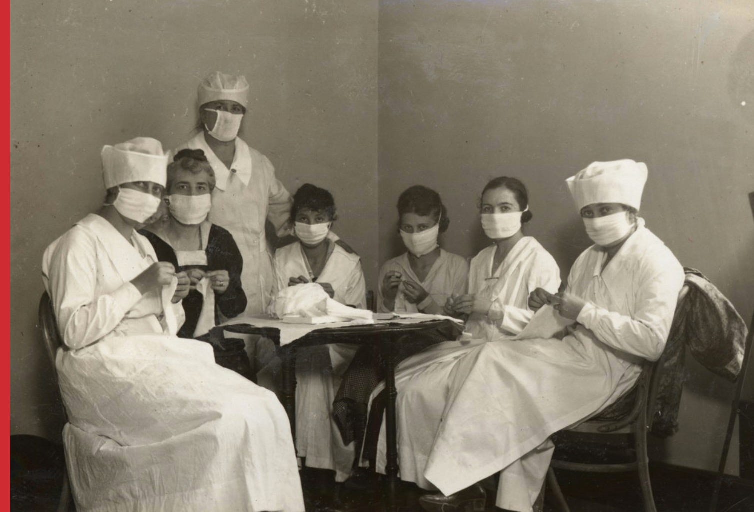 Members of the War Camp Community Committee make flu masks, in San Francisco, in 1918.