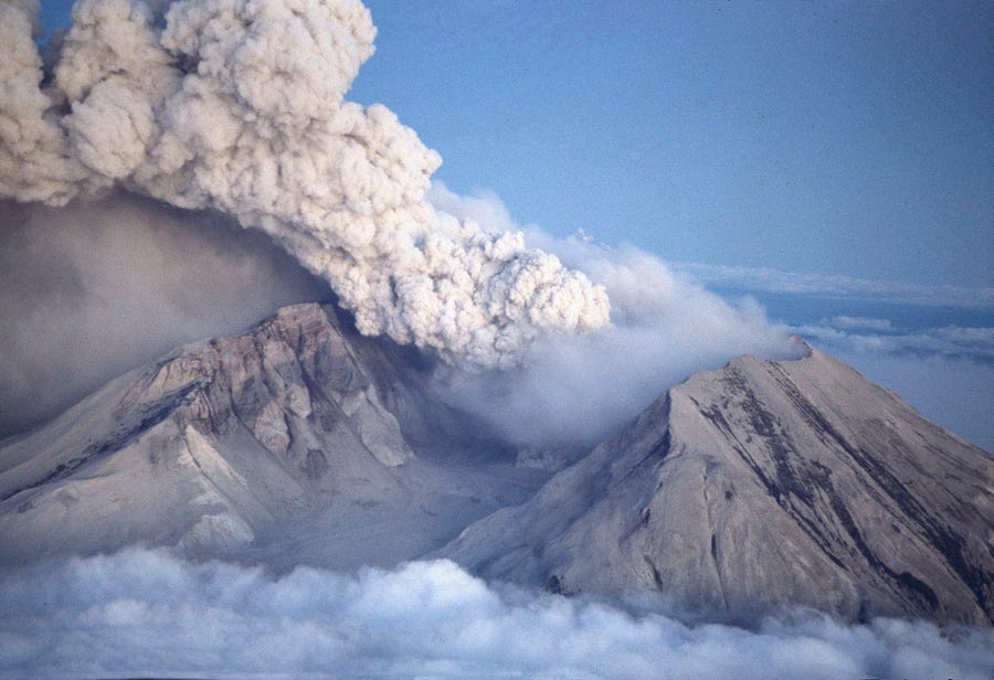 Volcanic ash and steam rise from Mount St. Helens as it erupts in Washington on May 18, 1980.