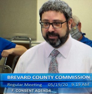 Brevard County Housing and Human Services Director Ian Golden details the housing assistance program proposal to county commissioners.