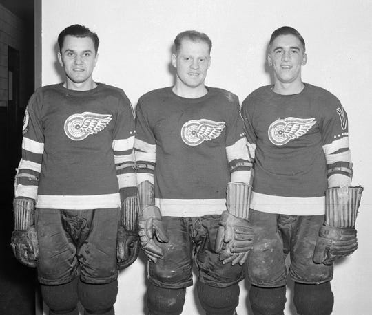 Red Wings forwards Steve (Wojciechowski) Wochy, from left, Jud McAtee and Ted Lindsay pose for a photo during the 1944-45 NHL season at Maple Leaf Gardens in Toronto. (Imperial Oil-Turofsky/Hockey Hall of Fame)