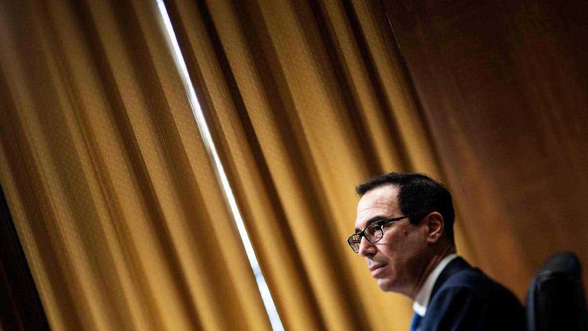 In this file photo taken on February 12, 2020, Secretary of the Treasury Steven Mnuchin attends a hearing of the Senate Finance Committee on Capitol Hill, in Washington, D.C.