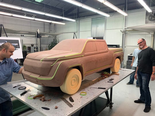 Lordstown Motors engineers work on designing clay models of the all-electric Endurance pickup.