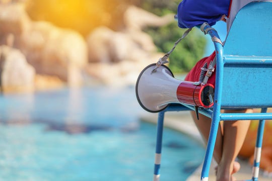 Lifeguards who are not actively monitoring the pool itself should be assigned to enforce things like social distancing, handwashing, the CDC said.