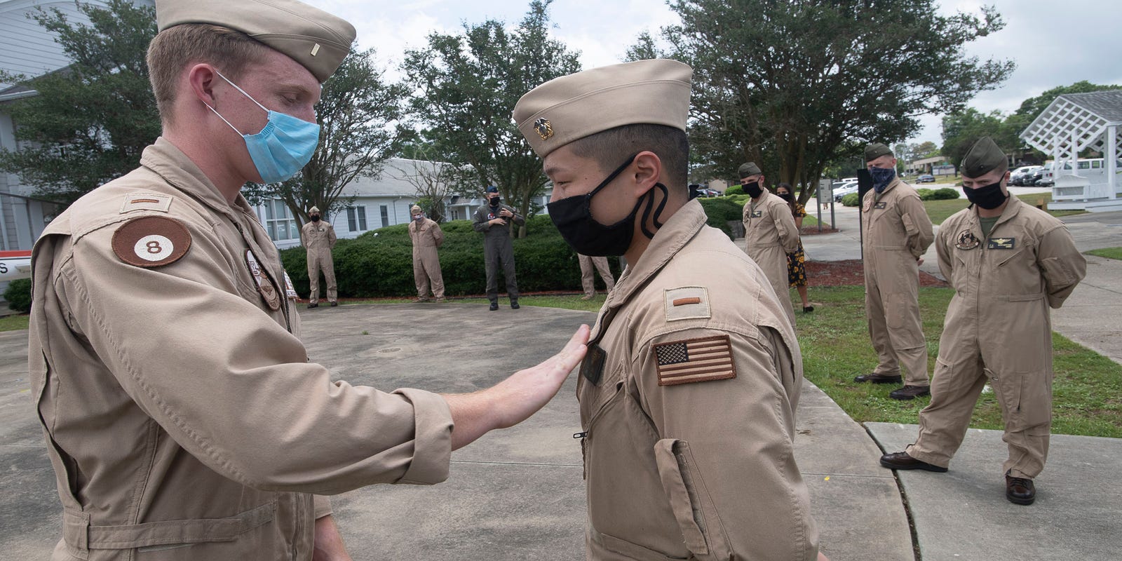 Navy honors naval aviators with wings of gold at limited ceremonies